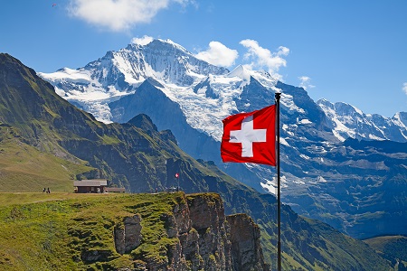 Muslim Immigrants Want Swiss to Change the Flag Because it is a